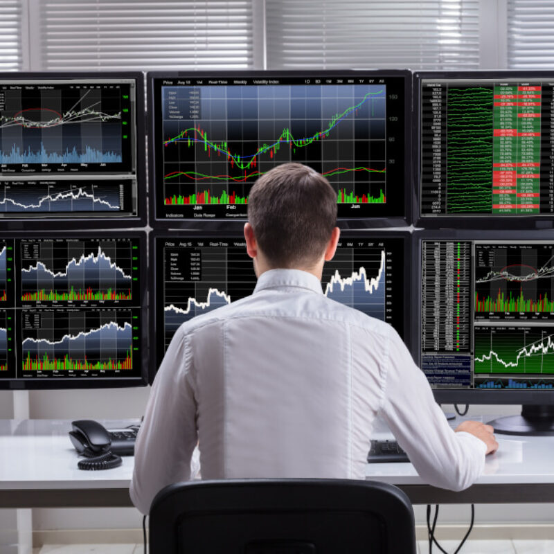 Side,View,Of,A,Young,Male,Stock,Market,Broker,Analyzing