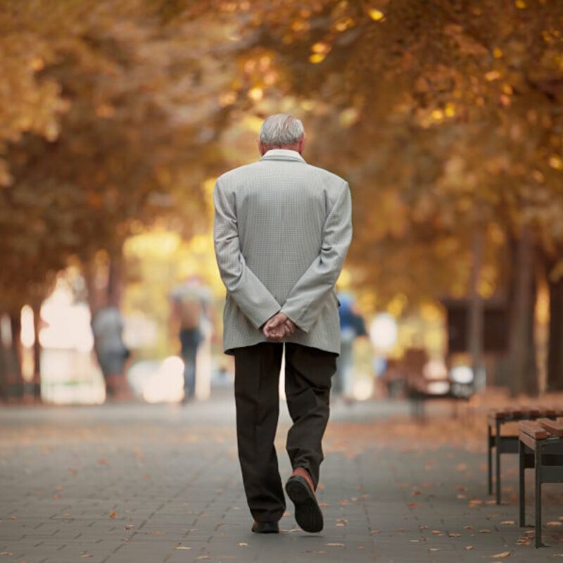 Old,Man,Walking,In,The,Autumn,Park.